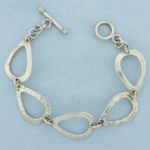 Hammered Finish Teardrop Link Bracelet In Sterling Silver