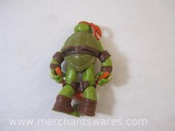Four Michelangelo Teenage Mutant Ninja Turtles Figures including 2013 Stealth Tech Michelangelo,