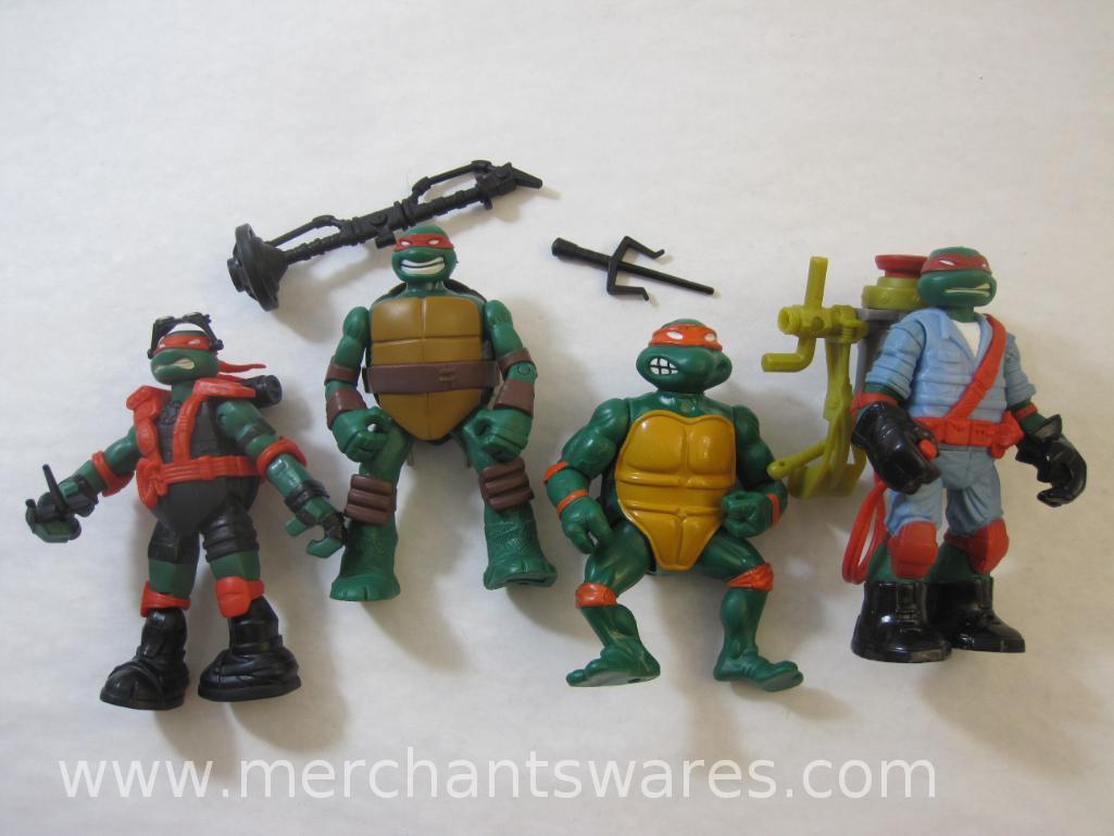 Four Teenage Mutant Ninja Turtles including 2013 Stealth Tech Raphael, 2012 Hand to Hand Ooze