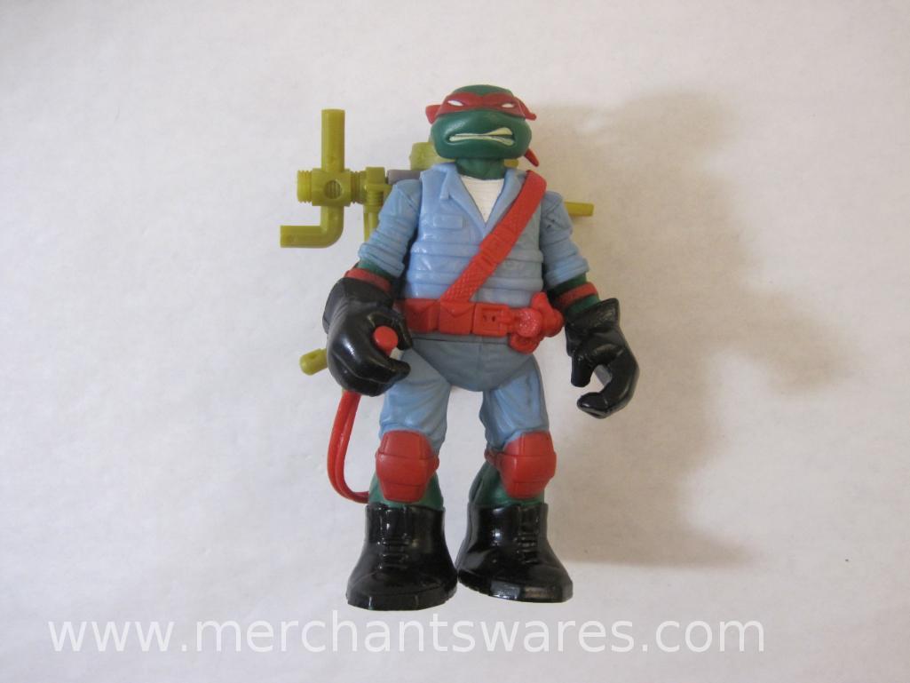 Four Teenage Mutant Ninja Turtles including 2013 Stealth Tech Raphael, 2012 Hand to Hand Ooze