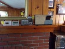 Group of (4) Thermometers on Mantel and Vintage Montgomery Ward Transistor