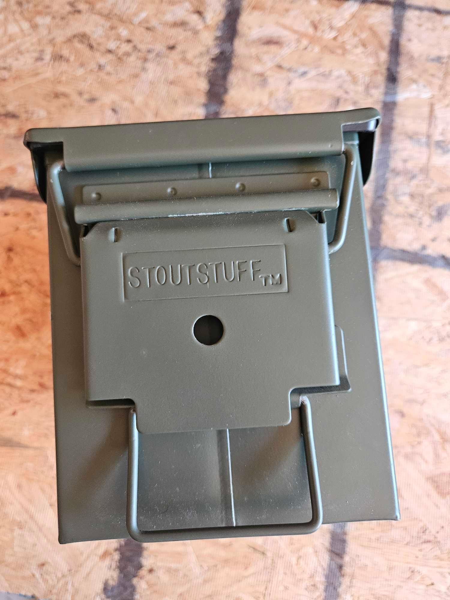 Ammo box with a few pieces of odd gear