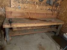 Wooden shop bench with attached vice, 8 feet W2' D by 34 inches H