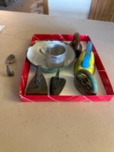 Child's spoon, misc. styles of sad irons,enamel bowl with nursery...rhyme,alluminium tin cup with "T