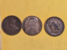 Three different types of British-India 1/4 anna copper coins