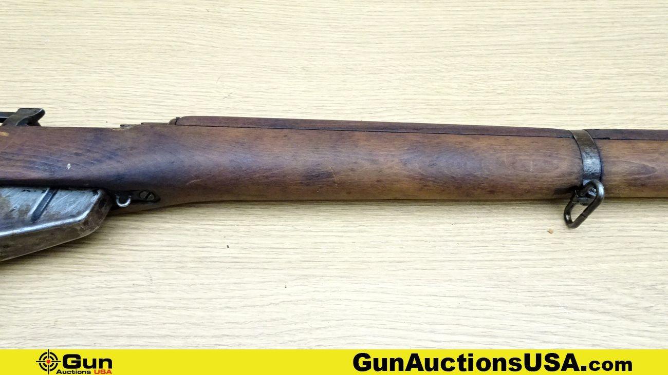 LEE-ENFIELD NO.4 MK1 .303 Rifle. Good Condition . 25.25" Barrel. Bolt Action Features Straight Grain