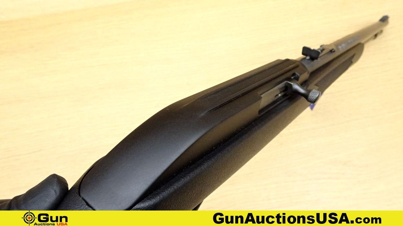 Marlin 60 .22 LR Rifle. Like New. 19" Barrel. Semi Auto Features a Black Polymer Stock with Checkeri