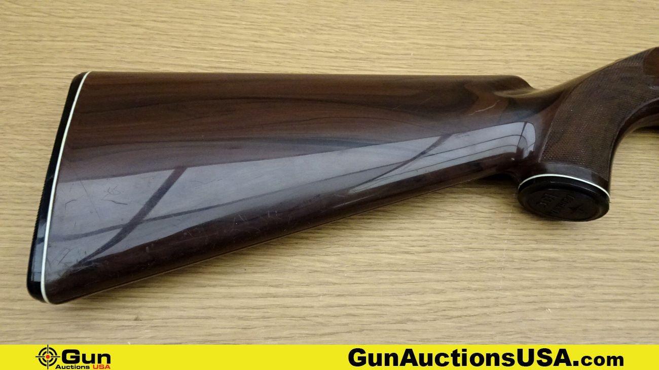 REMINGTON MOHAWK 10C .22 LR NYLON MOHAWK 10C Rifle. Good Condition. 19.5" Barrel. Shiny Bore, Tight