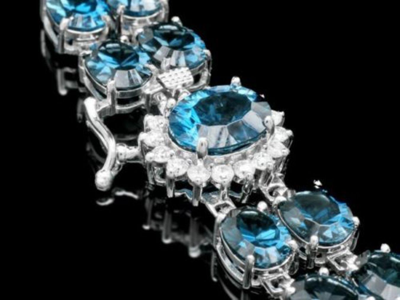 14K Gold 48.69ct Blue Topaz 0.57ct Diamond Bracelet