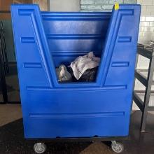 BLUE CART ON WHEELS, WITH BAGS OF USED CLOTH NAPKINS