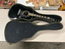 Epiphone Hummingbird acoustic guitar with hard case