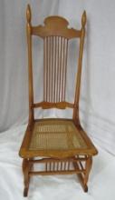ANTIQUE ROCKING CHAIR WITH CANED SEAT