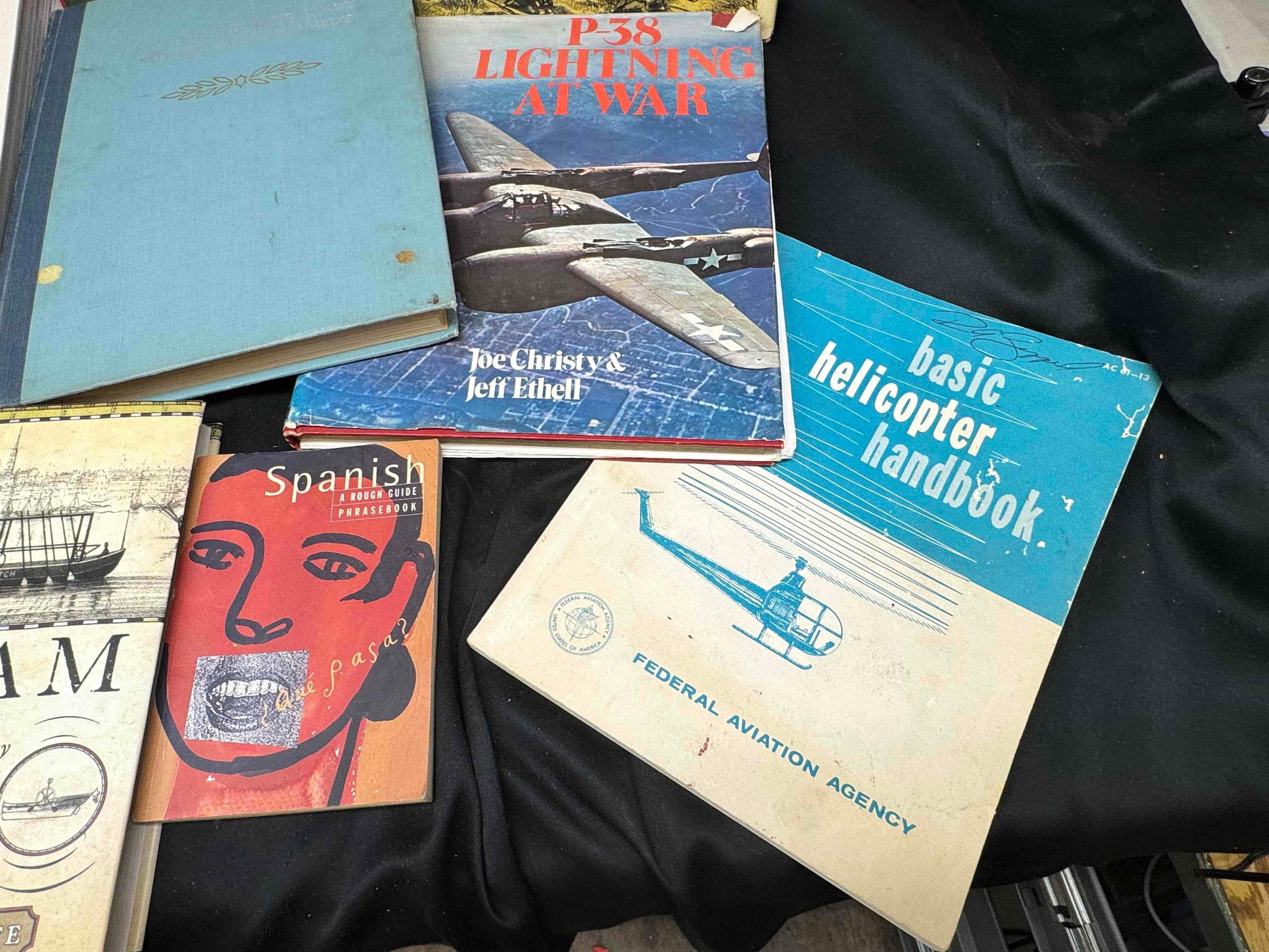Assorted Books. Monet, Treasure Island, Norman Rockwell more