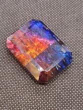 Rectangular Opal Like Ammolite Beautiful Blue And Red Hues In the Gemstone 109.15ct