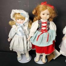 Lot of 7 porcelain collectors dolls Chatelaine Mann
