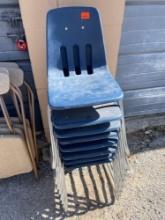 Stack of 8 Metal and Plastic Childrens Chairs