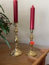Gold candleholders with candles