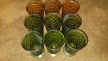 green and amber glassware cups