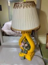 Table lamp with a yellow base