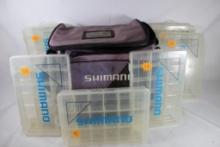 Large Shimano nylon fishing system with six plastic lure boxes. Used.