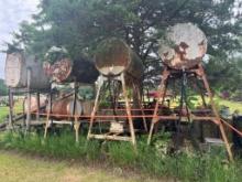 4 fuel tanks on stands