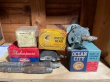 Vintage Fishing Reels, Boxes, Trolling Guide and Misc