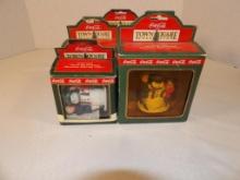 (5) COCA-COLA TOWN SQUARE COLLECTION FIGURES INCLUDING (2) "THIRSTY THE SNOWMAN," "CHECKER PLAYERS,"