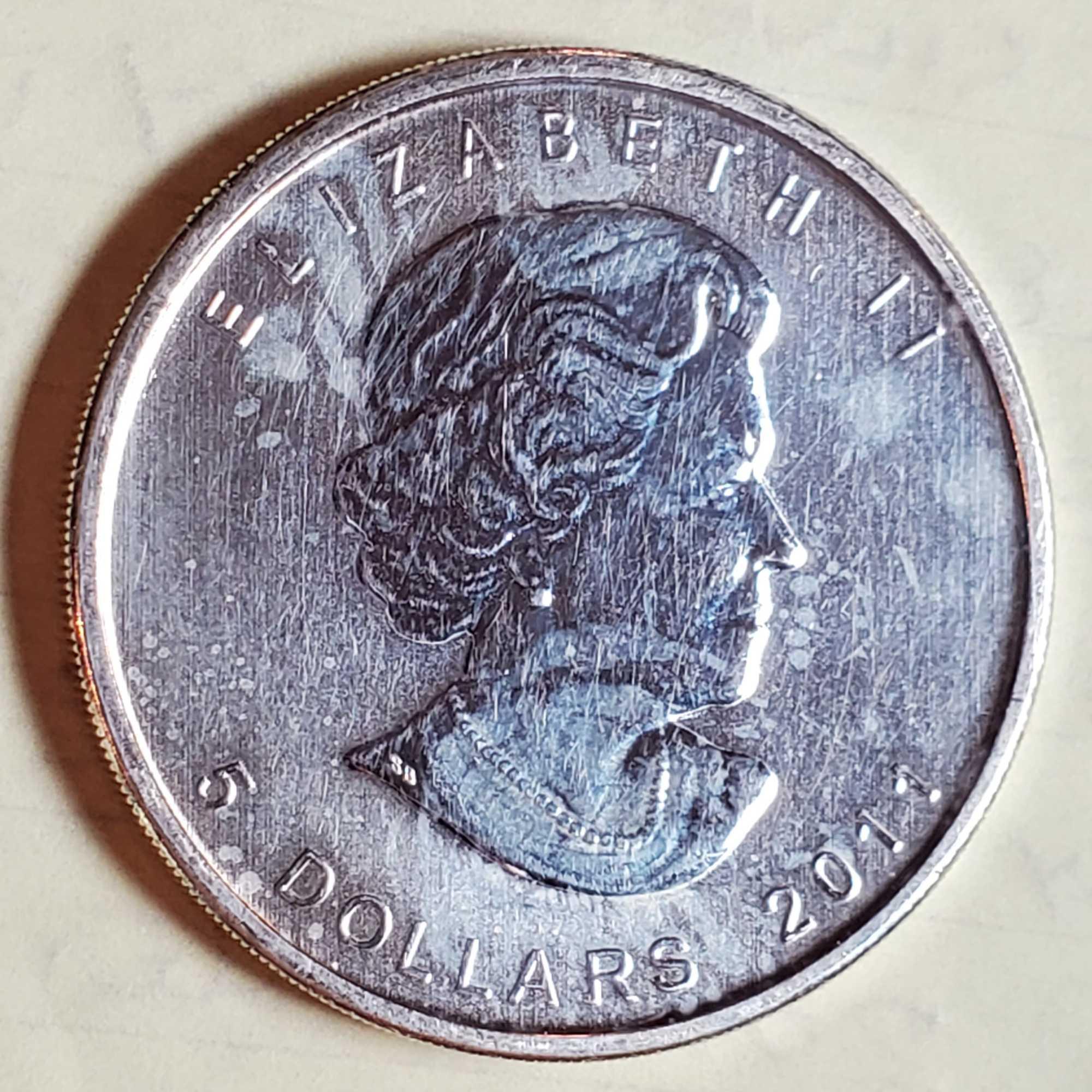 4 1 Oz .999 Silver Bullion Coins - 2015 & 2016 Silver Eagles, 2011 Maple Leaf and 2023 Libertad