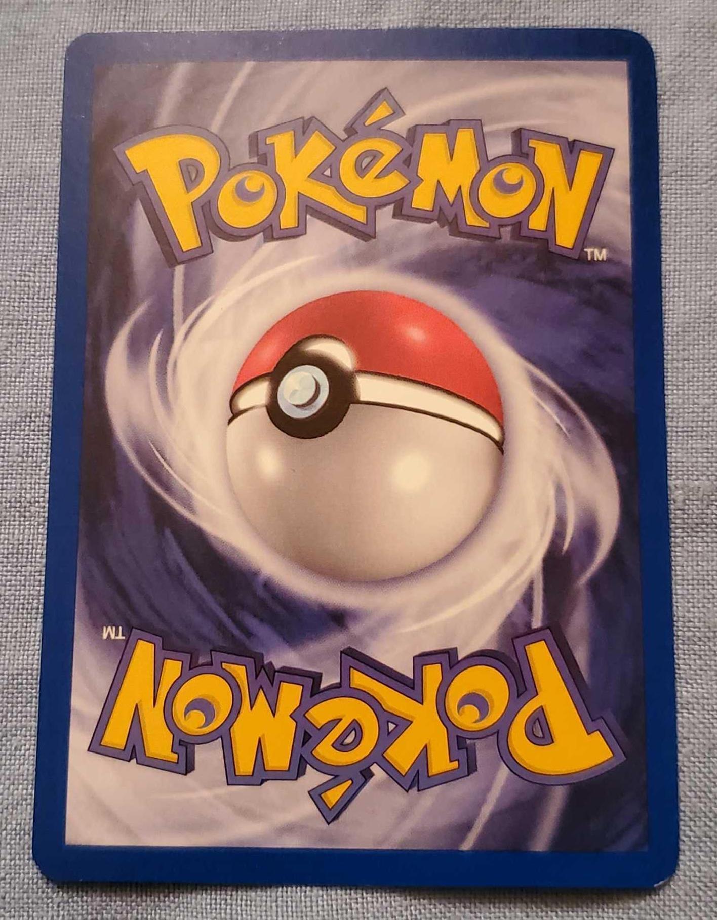 Album of 1999-2007 Pokemon Cards In Pokemon Album with The Electric Tale of Pikachu 4 Vol. Comic