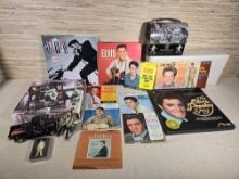 Elvis Presley 45 Records, Hard Cover Books, & More
