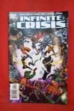 INFINITE CRISIS #4 |1ST MEETING OF BOOSTER GOLD AND JAMIE REYES - BLUE BEETLE
