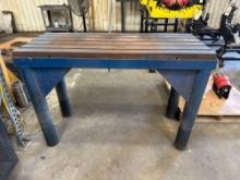 55? L X 22? W X 38? H Slotted Table on Metal Table