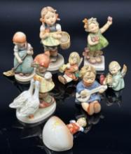 Eight Goebel Hummell Figurines