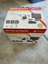 Utilitech motion activated solar powered security light LED in box