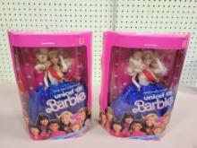 2- Unicef Barbie's in original package