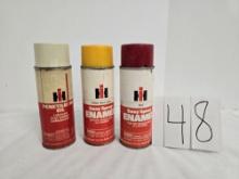 2 cans of  IH spray enamel "red and yellow" 1 can of penetrating oil