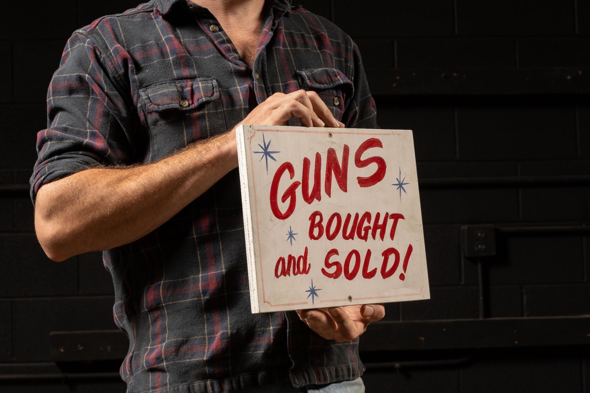 Vintage Hand-Painted Gun Sales Sign
