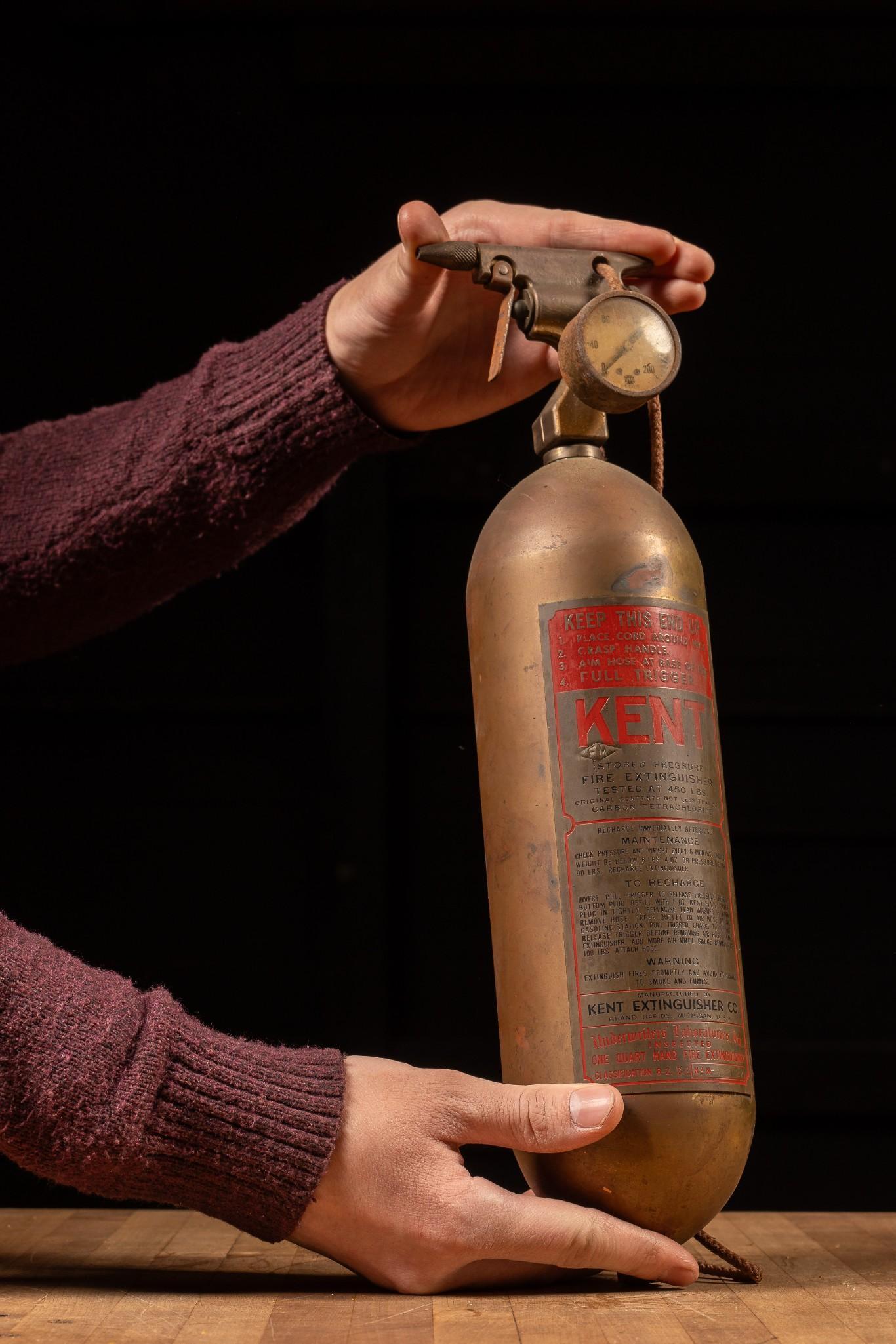 Antique Fire Extinguisher by Kent