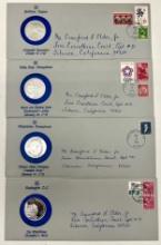 4 Postal Commemorative Society envelopes & Silver medals