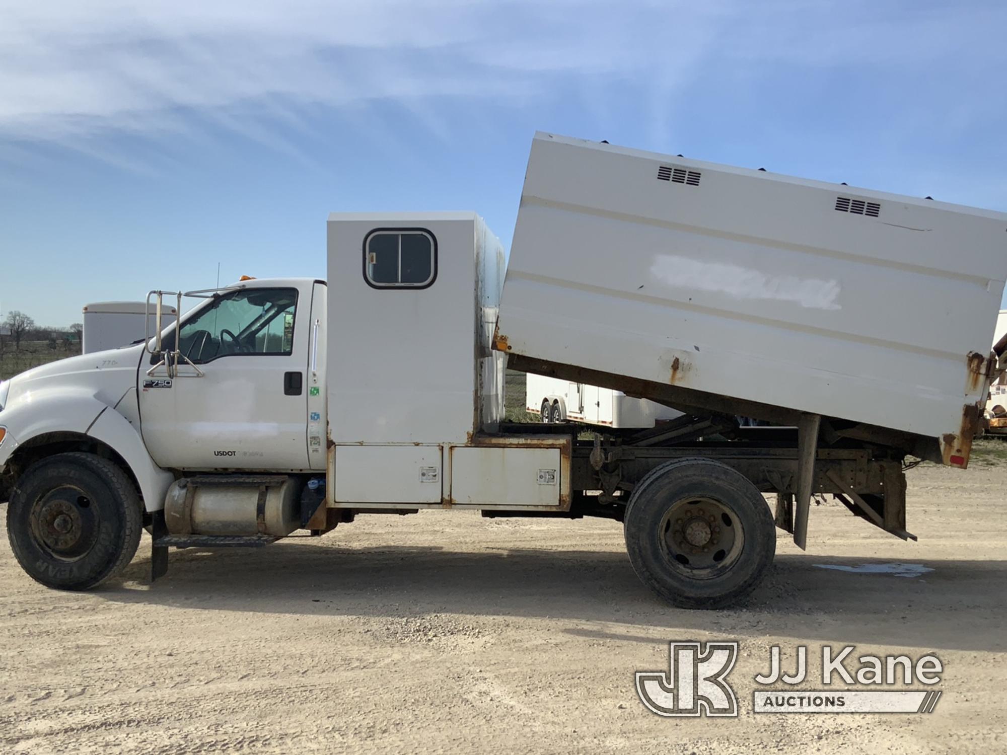 (Charlotte, MI) 2011 Ford F750 Chipper Dump Truck Runs, Moves, Dump Operates, Service Engine Light.