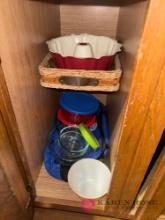 contents of kitchen cabinet pyrex bowls and miscellaneous