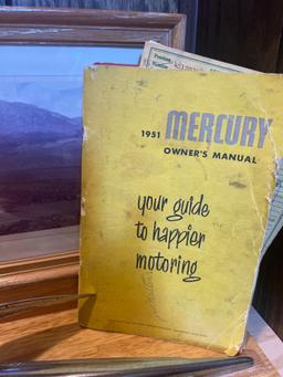 1951 Mercury car manual and plaque in basement
