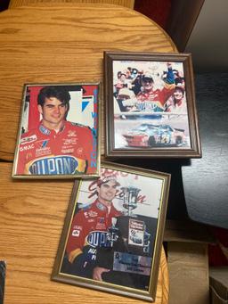 7- framed NASCAR pictures in basement