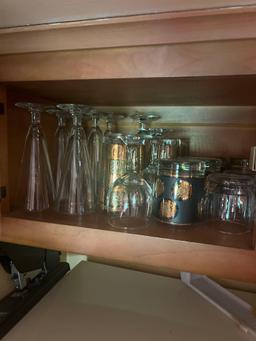 cabinet above refrigerator beer mugs