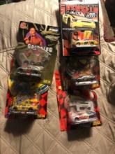 5- Racing Champions Nascar stock cars 1/ 64 scale