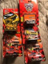5- Racing Champions Nascar stock cars 1:64 scale