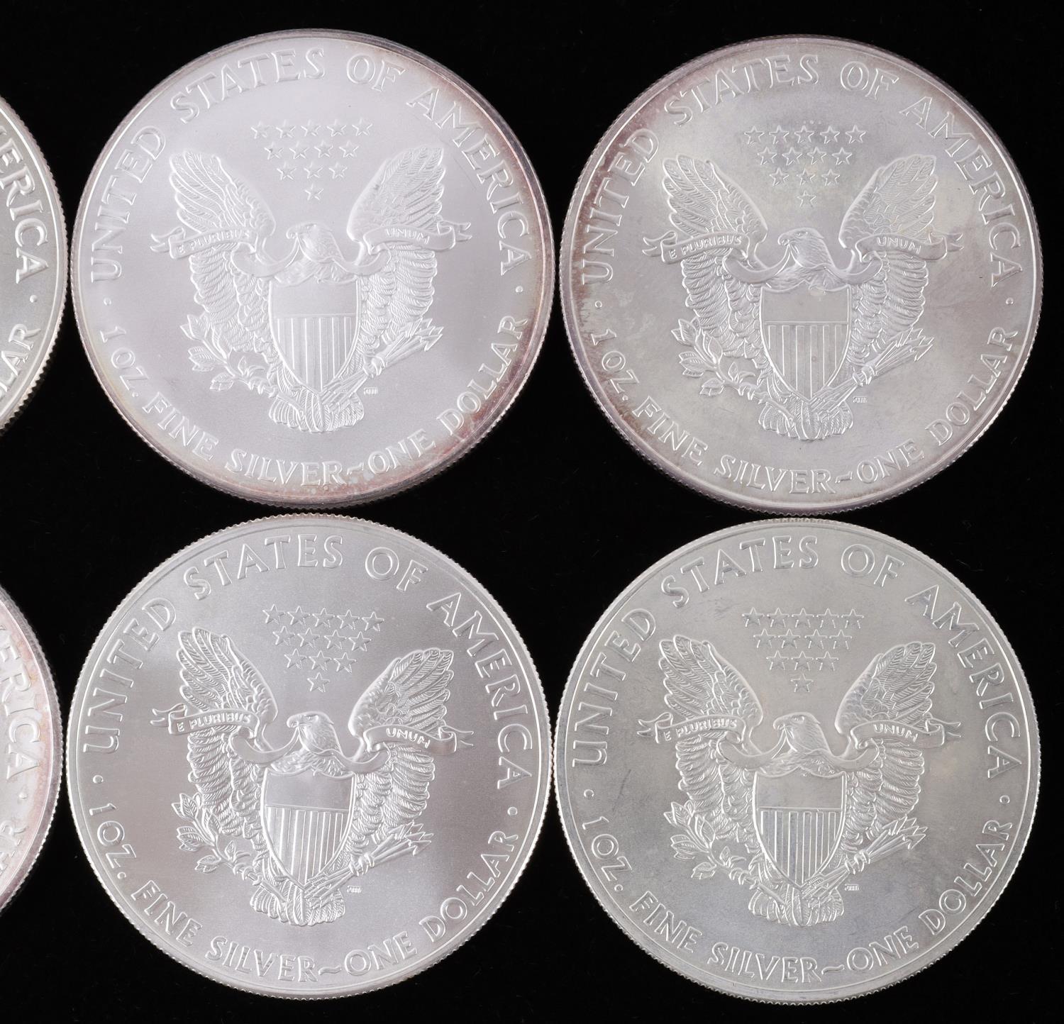 LOT OF 8 1 OZ AMERICAN SILVER EAGLE $1 COINS