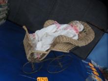 WICKER STROLLER AND DOLL