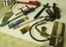 Sheet rock and mortar trowels, mixed tools, compression gauge, Stanley plane, brake cylinder hone, b