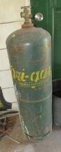 large bottle of patio gas (type of propane that jewelers use because it does no put out as much h...